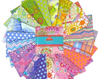 May include: A collection of colorful fabric swatches arranged in a circular pattern. The fabrics feature various floral, polka dot, and abstract designs in shades of pink, green, blue, and orange. A teal band with text is visible in the center.