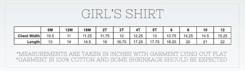 May include: A size chart for a girl's shirt, with chest width and length measurements in inches. Sizes range from 6 months to 12 years. The text states measurements are taken with the garment lying flat and that shrinkage is expected.