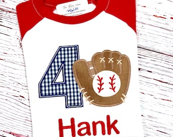 May include: White baseball themed birthday shirt with a blue and white gingham number 4, a brown baseball glove with a red baseball, and the name "Hank" in red lettering.