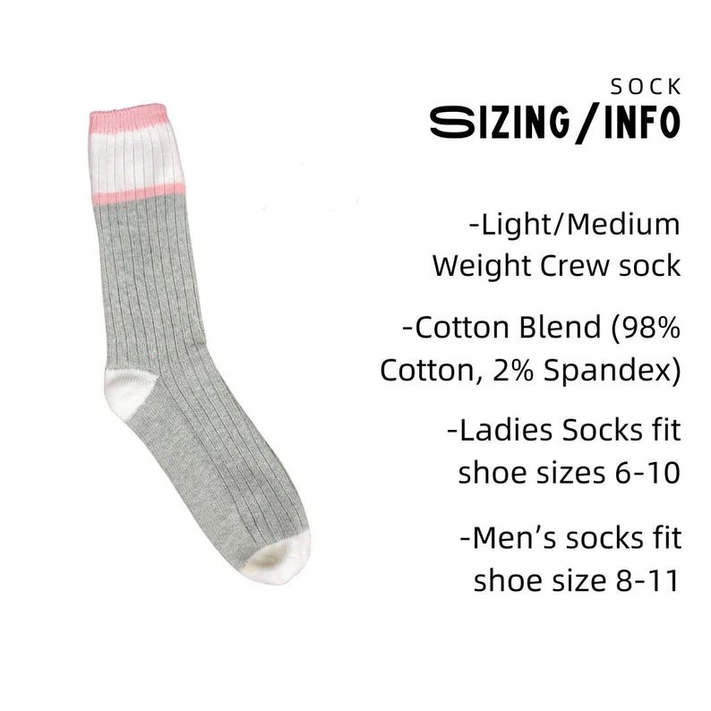 a gray and pink crew sock with a pink stripe, accompanied by text providing information about the sock's size and material.