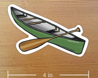 May include: Green canoe with a wooden paddle, 4 inches in length. The canoe has a black stripe and a white interior. The paddle has a brown handle and a white blade.