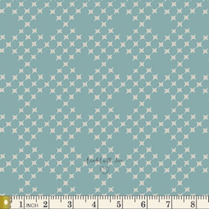May include: A teal fabric with a repeating pattern of off-white four-pointed stars. The stars are arranged in a grid-like formation. The text "Binded with Love" is visible in the lower center of the image. A ruler is at the bottom, showing measurements in inches.