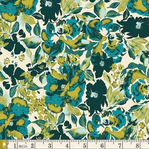 May include: Floral fabric with a cream background. The design features large, stylized flowers in shades of teal, dark teal, and olive green. The pattern includes leaves and smaller floral elements. The fabric is measured with a ruler in inches.