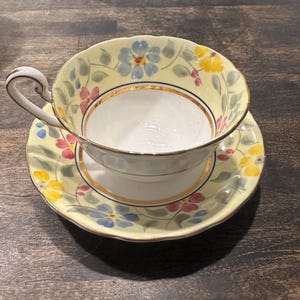 Vintage Victoria Bone China teacup and saucer