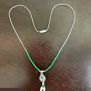 Vintage Liquid Silver Strand Bead Necklace with Green Malachite Beads Bear Claw Pendant Charm with Feathers Hand Crafted