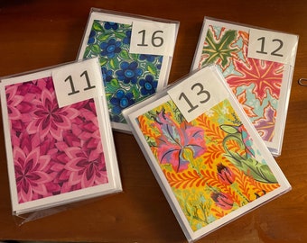 May include: Four cards with different floral patterns. The cards are numbered 11, 12, 13, and 16.