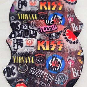May include: Two round coasters with a black background and a collage of colorful band logos and names, including Nirvana, KISS, The Who, Led Zeppelin, The Strokes, and Oasis.