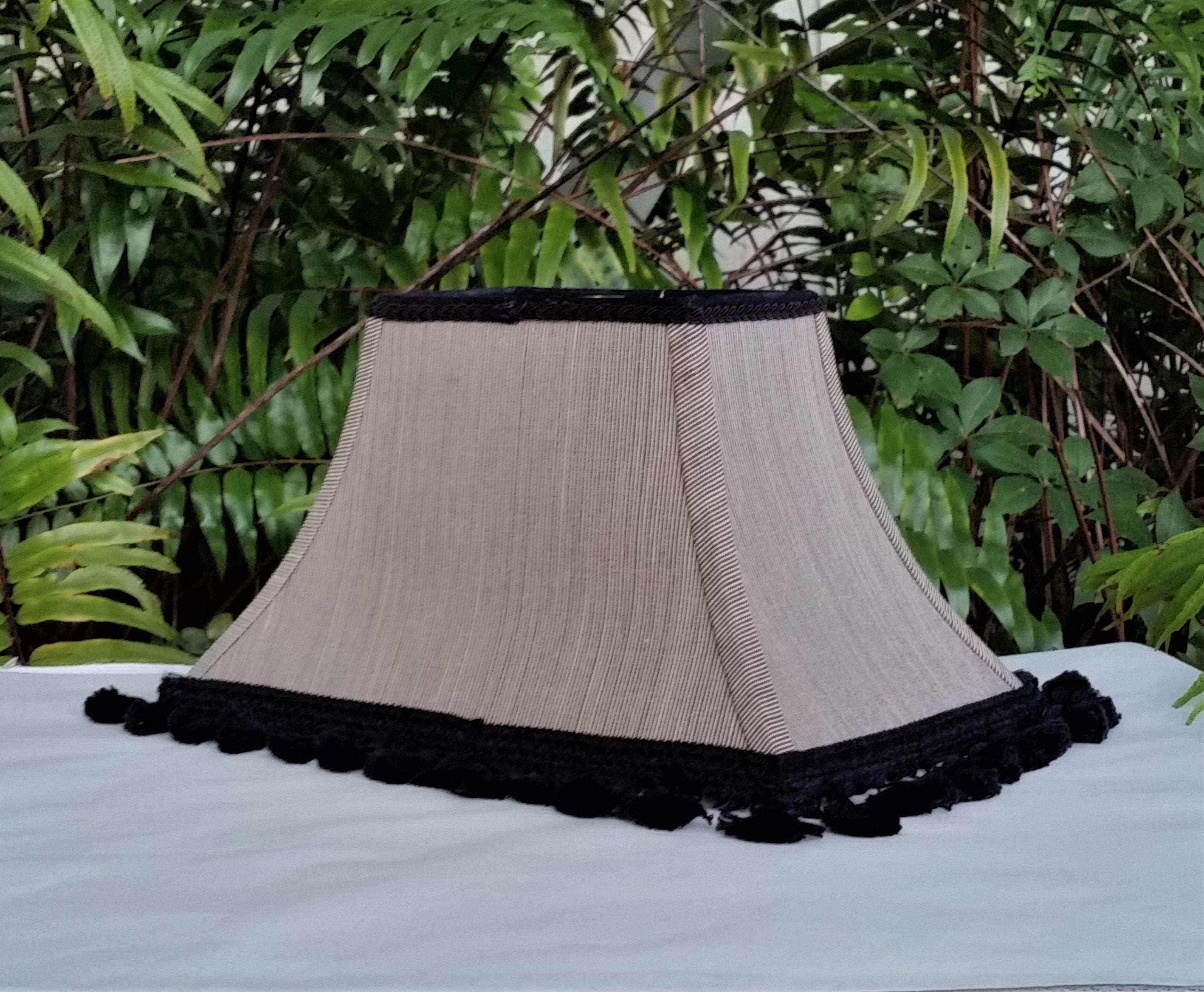 white lamp shade with black trim