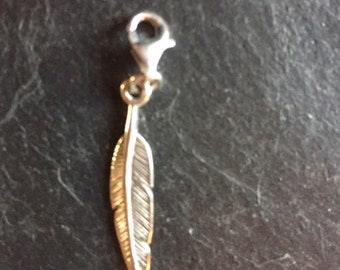 feather charm in sterling silver with lobster clasp for bracelets. This is handmade and hallmarked. Great valentines or Mother's Day gift