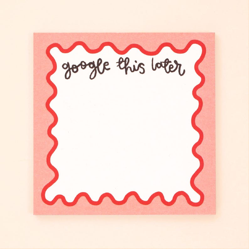May include: A pink note with a red wavy border. The note says "google this later" in black handwriting.