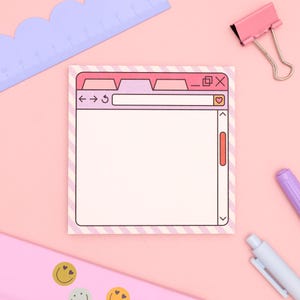May include: Square sticky note pad with a pink and white striped border. The design resembles a computer window with tabs, a search bar, and a scroll bar. The background is a light pink.