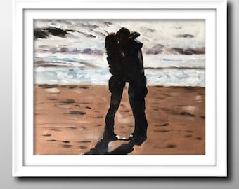 May include: Oil painting in a white frame depicts a couple embracing and kissing on a beach. The artwork features a sandy shore, ocean waves, and a cloudy sky. The figures are silhouetted, creating a romantic and intimate scene.