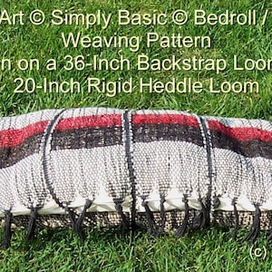 May include: A rolled up black, white, and red striped blanket woven on a 36-inch backstrap loom or a 20-inch rigid heddle loom. The blanket is lying on green grass. "Simply Art Simply Basic Bedroll / Blanket Weaving Pattern" is written above the blanket.  "(c) 2010 laeom" is written below the blanket.