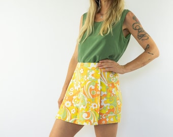 Vintage retrorok | Jaren 70 | Korte broek met bloemmotief | Geel/Groen/Wit | Minirok | Psychedelisch/mod | Gemaakt in Frankrijk | Maat S/M