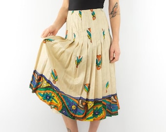 Jupe Vintage en Soie 1970s | Jupe Plissée Trapèze Mi-Longue | Fond Crème à Motif Floral Stylisé Multicolore | Ourlet Ornemental | Taille S/M