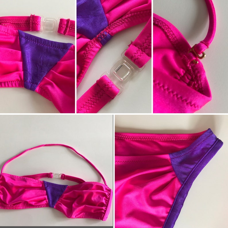 May include: A pink and purple bikini top with adjustable straps and a clasp fastening. The top has a bandeau style with a gathered detail at the front.