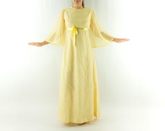 Sukienka maxi w kwiaty w stylu vintage z lat 70. | Żółte, empire'owe białe kwiaty | Przezroczyste rękawy dzwonkowe | Francja | S