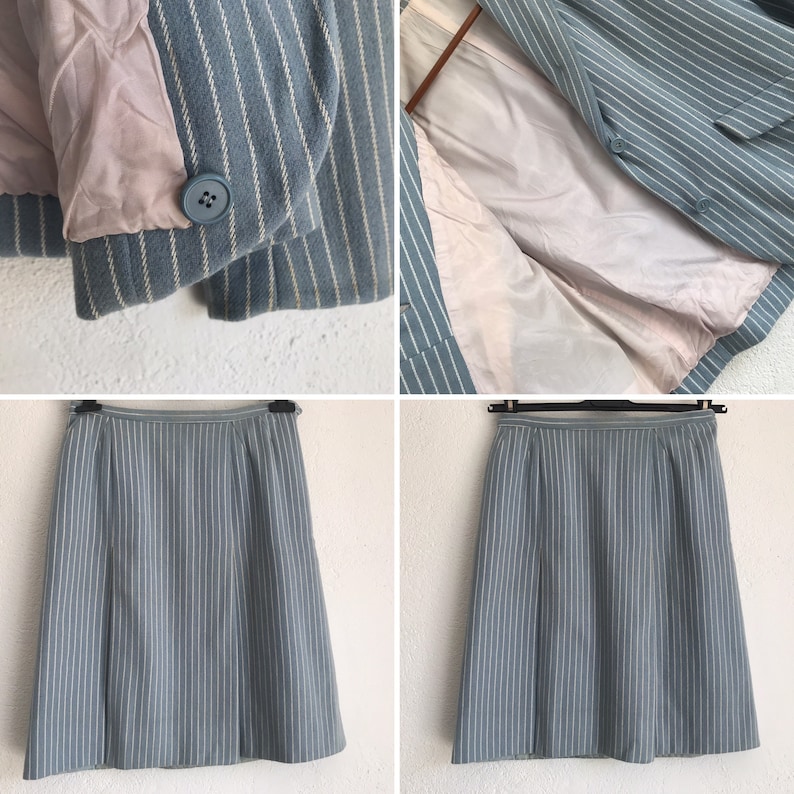 Puede incluir: Un traje de falda azul y blanco a rayas. La falda es de l&iacute;nea A y la chaqueta tiene un cierre de un solo bot&oacute;n.