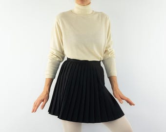 Vintage Uhrenhaus Minirock 1970er Jahre | Schwarzer Faltenrock mit hoher Taille | S
