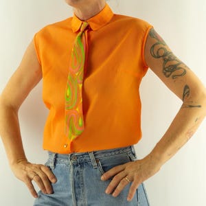 Schapira Vintage Women&#39;s Blouse 1960s | Orange Seersucker Fabric with Psychedelic Tie | Sleeveless Mod Pop Top | Size M