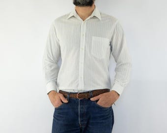 Camisa vintage Yves Saint Laurent, años 80, blanca, con botones y rayas azules finas, mod., Francia, talla S