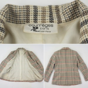 Pu&ograve; includere: Un blazer vintage con motivo a quadri nei toni del marrone, beige e rosso. La giacca presenta un colletto a revers e una vestibilit&agrave; su misura. L'etichetta recita "courr&egrave;ges paris made in france".