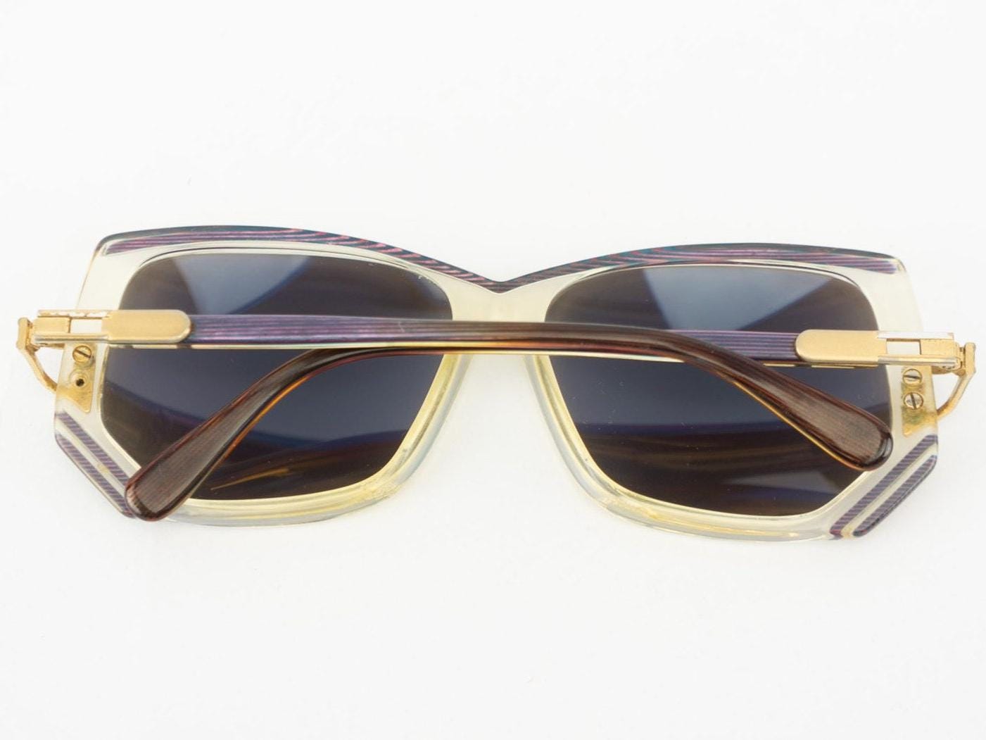 Cazal ビンテージサングラス クリア/ゴールド Cazal 176 ヴィンテージサングラス 1980年代 | 透明パープルアセテート