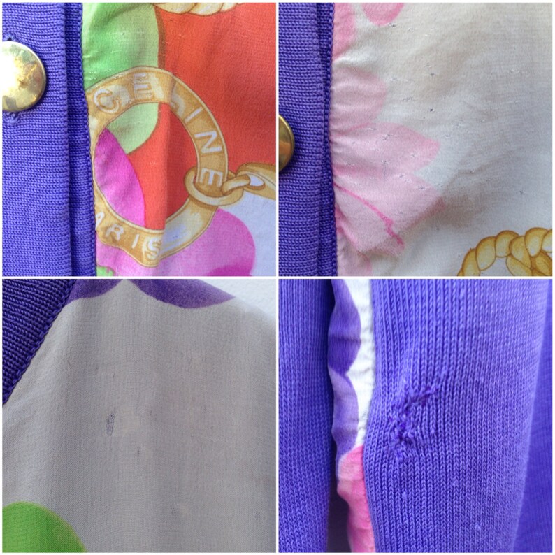 May include: A purple cardigan with a white and pink floral print. The cardigan has a button closure and a gold button. The cardigan has a small hole in the sleeve.