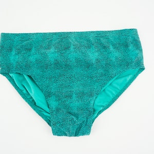 Zonne-energie | Vintage zwembroek | Jaren 70 | Zwemkleding voor heren | Zwemslip met hagedispatroon | Turkoois/zwart | Retro zwembroek | NOS | Maat L