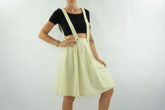 Mustard skirt with suspenders top