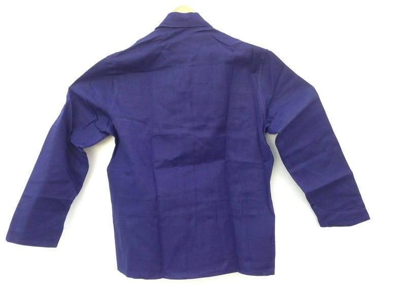 May include: A long-sleeved, solid blue work shirt with a button-up collar.