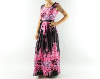 May include: A sleeveless, floor-length dress with a black and pink floral pattern. The dress features a black belt at the waist and a round neckline. The skirt has vertical black stripes with pink floral accents.