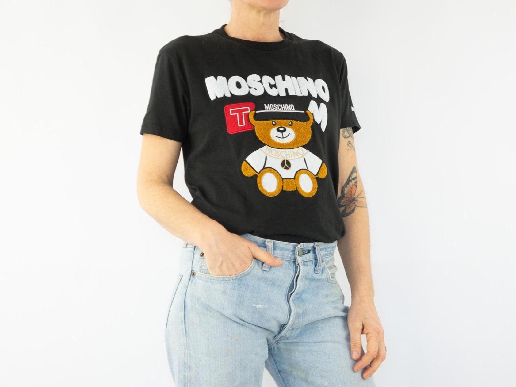 Moschino ロコ レタリンク トロッフ ヒアス 25171A91368408 1607 Moschino ロゴ ブラ | ピンク | FARFETCH JP