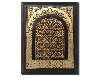May include: A framed artwork featuring a gold-colored intricate geometric design, resembling a window or archway, with a dark brown wooden frame.