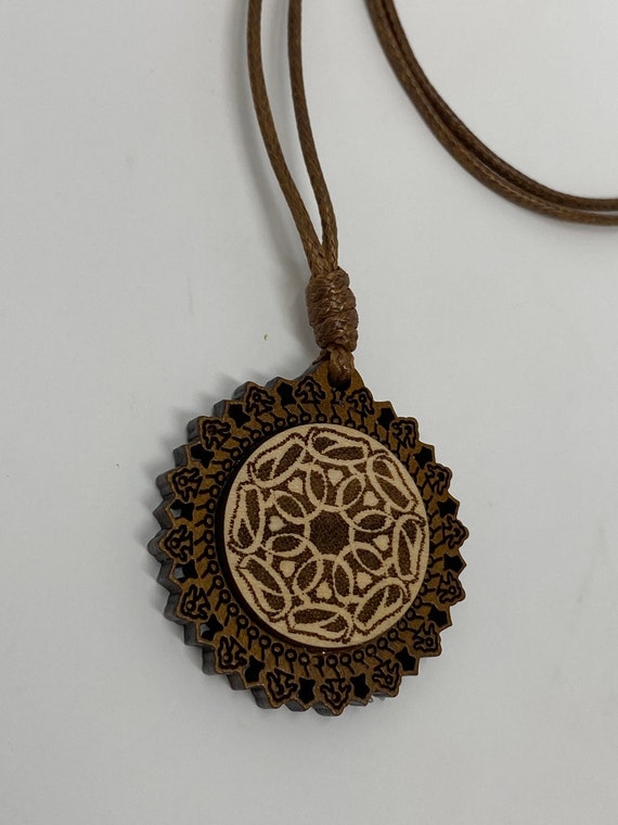 The Arabesque® Wooden Engraved Pendant with Adjustable 18" Leather Cord Necklace with a Love in Arabic Calligraphy Roundel