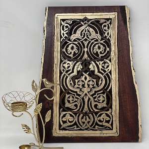 The Arabesque Wooden Wall Hanging with Medieval Fatimid Woodburned Art Pattern. Historical Islamic Art Design.