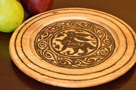 Wooden plates; decorative plates; placemat; wedding placemat; bunnies; rabbits; hares; medieval Islamic art; Fatimid art; woodburning;