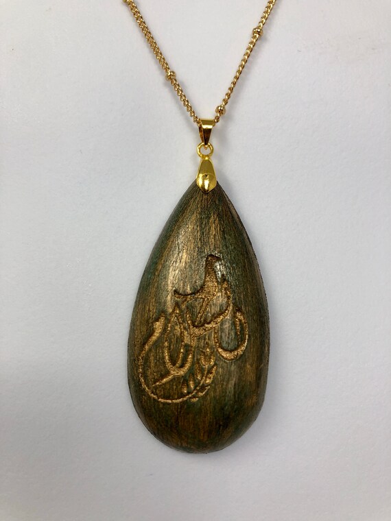 Wooden Peace Pendant In Tear Drop Shape and Engraved in Arabic Calligraphy (al-Salam) With 32" 14k Gold Plated Ball Chain by The Arabesque®