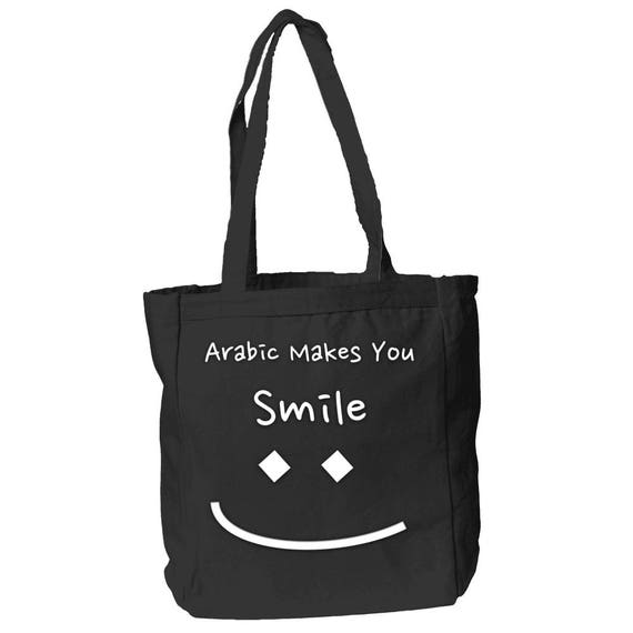 The Arabic Taa Will Make You Smile 12 oz Canvas Book Tote Bag By The Arabesque