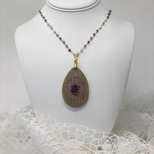 The Arabesque® Wooden Engraved Medieval Bunny Teardrop Pendant with Tanzanite, Aqua Marine, and Pearl 24k Gold Plated Rosary Bead Necklace