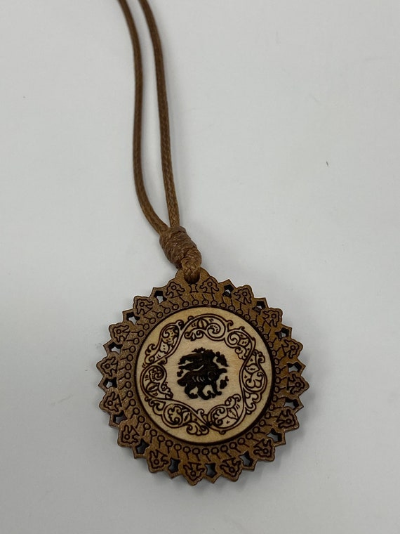 The Arabesque® Wooden Engraved Pendant with Adjustable 18" Leather Cord Necklace with a Medieval Bunny and Arabesque Design