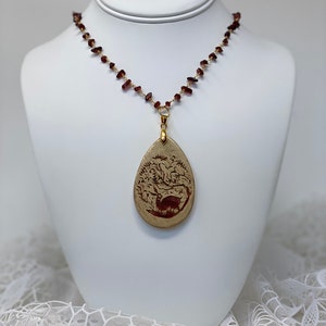 The Arabesque® Wooden Engraved 16th Century Bunny Design Teardrop Pendant with Garnet Nugget Bead 24k Gold Plated Rosary Necklace