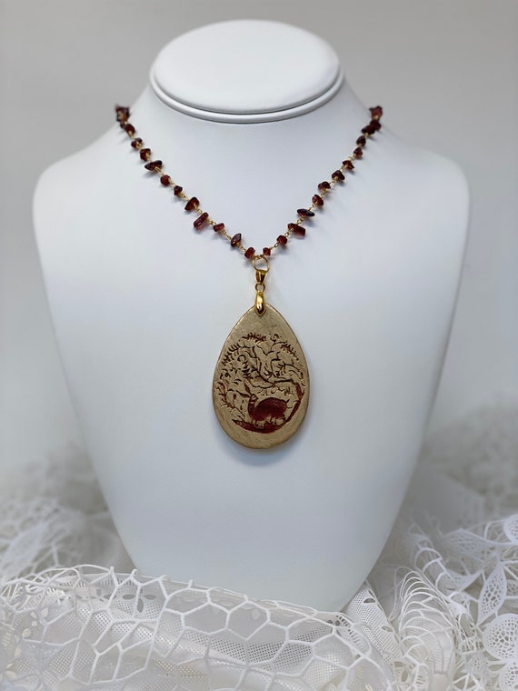 The Arabesque® Wooden Engraved 16th Century Bunny Design Teardrop Pendant with Garnet Nugget Bead 24k Gold Plated Rosary Necklace