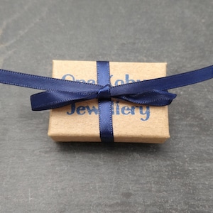 Giftbox with blue ribbbon