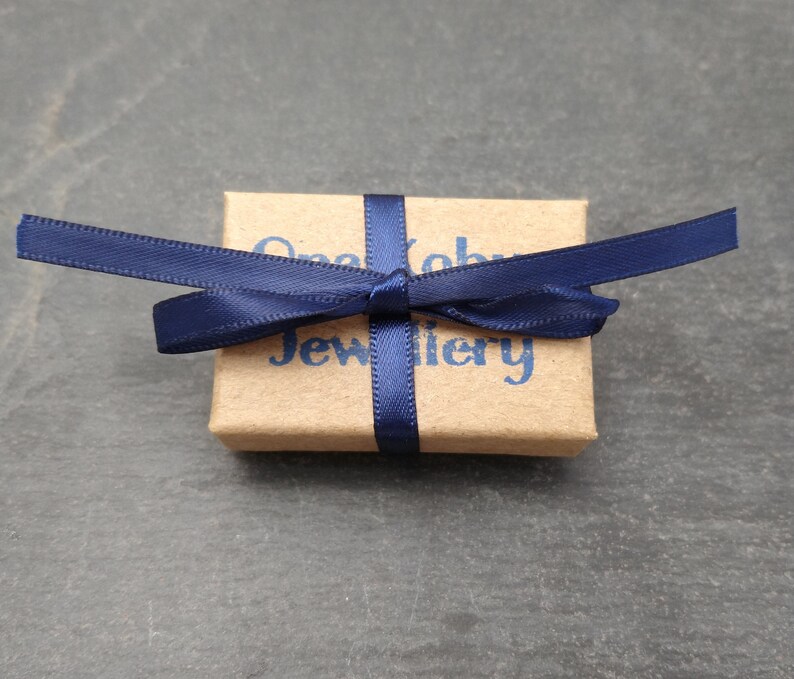 Giftbox with blue ribbbon