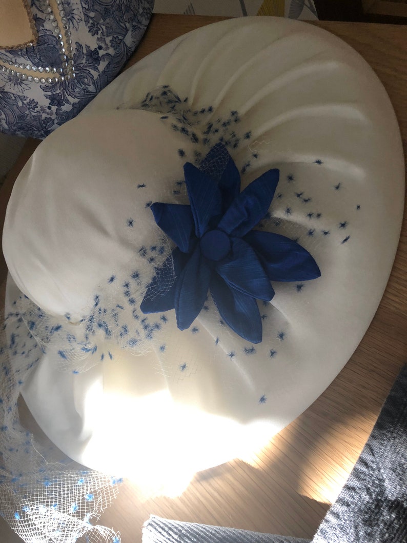 Ladies Hat Vintage Hat 1980 IVory Wide pleated Brim hat with blue ivory NEtting BLue flower