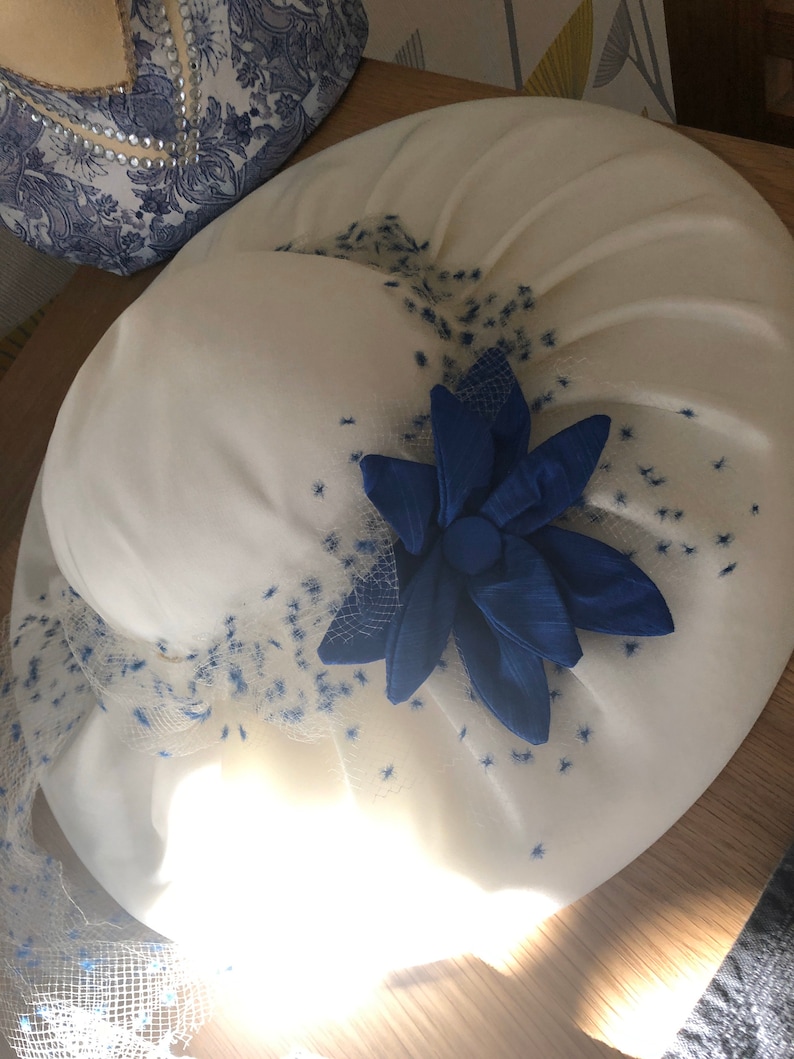 Ladies Hat Vintage Hat 1980 IVory Wide pleated Brim hat with blue ivory NEtting BLue flower