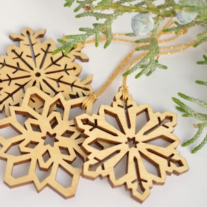 Snowflake ornaments wood cut decoration. Variety Set of three for tree decorating, jewelry making, crafting