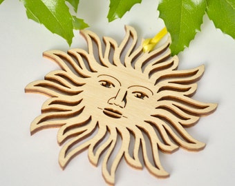 Sunface ornament wood cut decoration. Laser cut sun face ornament