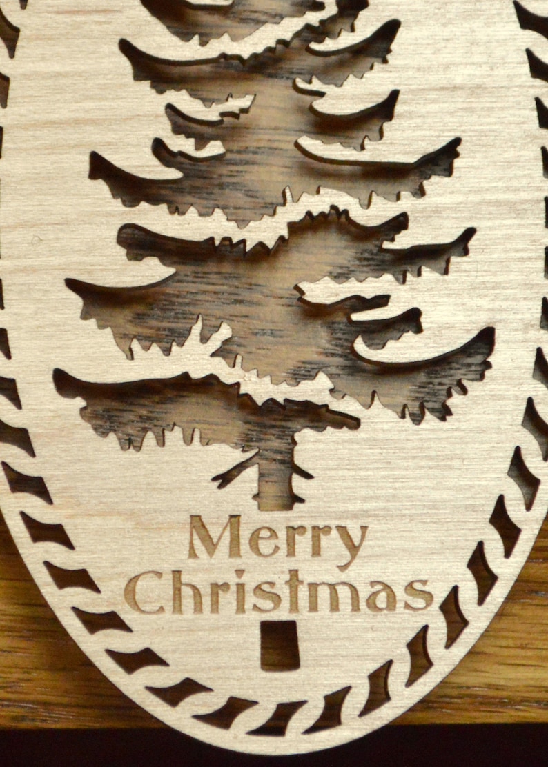 Woodcut Christmas ornament DouglasFir tree silhouette Merry Etsy